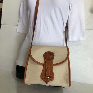 Dooney and Bourke AllWeatherLeather Vintage Essex handbag Ivory with Tan accents